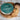 CBD Shaving Soap by Voyager with a wooden brush on a rustic surface