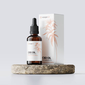 Voyager 3000mg CBD Orange & Lemon 30ml Oil with a light label and box on a white background