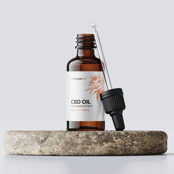 Voyager 1000mg CBD Peppermint 30ml Oil with a light label and pipette on a white background
