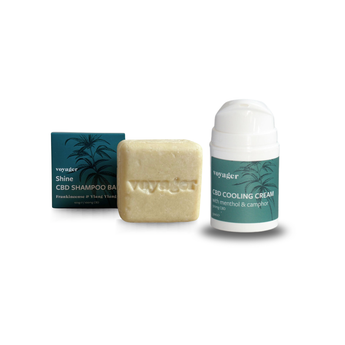 Voyager CBD products including a shampoo bar, cooling cream, and a box on a white background