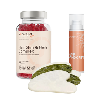 Voyager Life hair, skin, and nails complex with gummies and hand cream on a white background