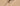 Pipette with oil on a beige background close-up