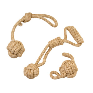 Beige rope dog toy with knotted ends on a white background